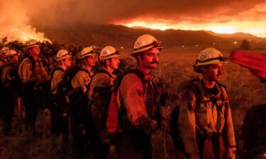 Firefighters from Cal Fire's Placerville station monitor the Sugar Fire