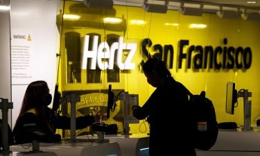 Hertz said it has reduced corporate debt by nearly 80%