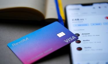 Revolut has been valued at $33 billion in a new fundraising round led by SoftBank and Tiger Global Management