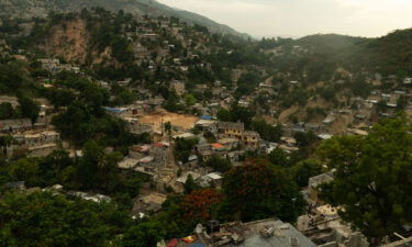 A general view of homes and a soccer pitch in Port au Prince