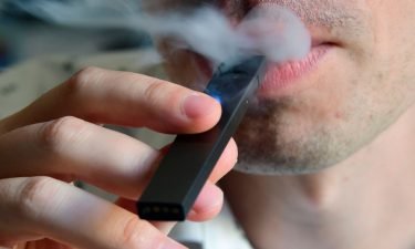 Juul Labs will pay $40 million and make changes to its business practices