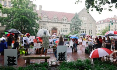 Anti-vaxxers and anti-maskers gathered at Indiana University's Sample Gates to protest against mandatory Covid-19 vaccinations IU is requiring for students