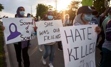 Young women march with signs during a Multi-Faith March to End Hatred after four members of a Muslim family were killed in a truck ramming attack in Canada. The Council on American-Islamic Relations (CAIR) has released a mid-year report highlighting serious cases of anti-Muslim incidents that occurred in the United States during the first seven months of 2021.