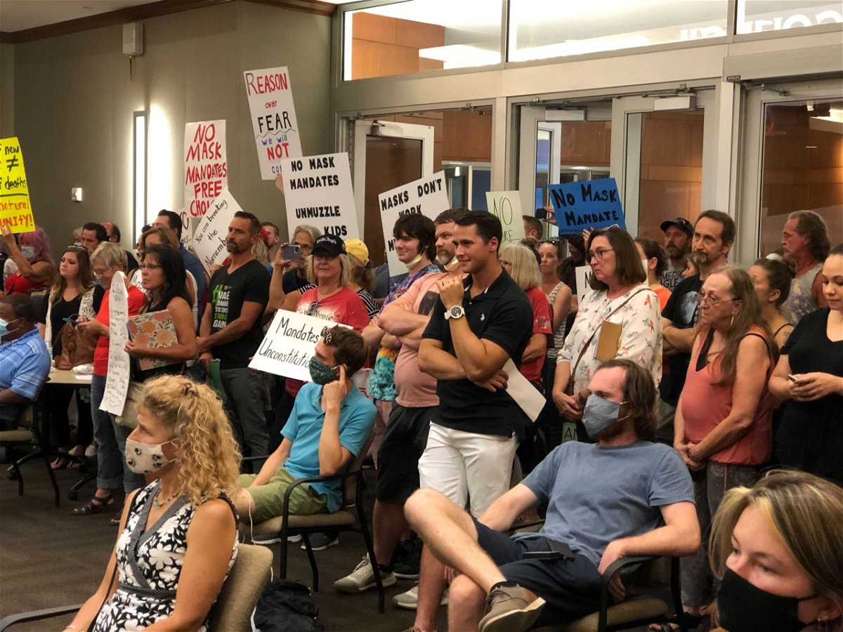 Opponents of a mask mandate gather in the Columbia City Council chambers Monday, Aug. 9, 2021, before a council vote. Many wore no masks despite a city order requiring them in city buildings.