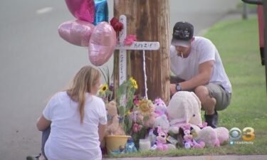 People have paid their respects continuously at the site of a small memorial full of teddy bears and flowers after three children and a man died in a violent crash.