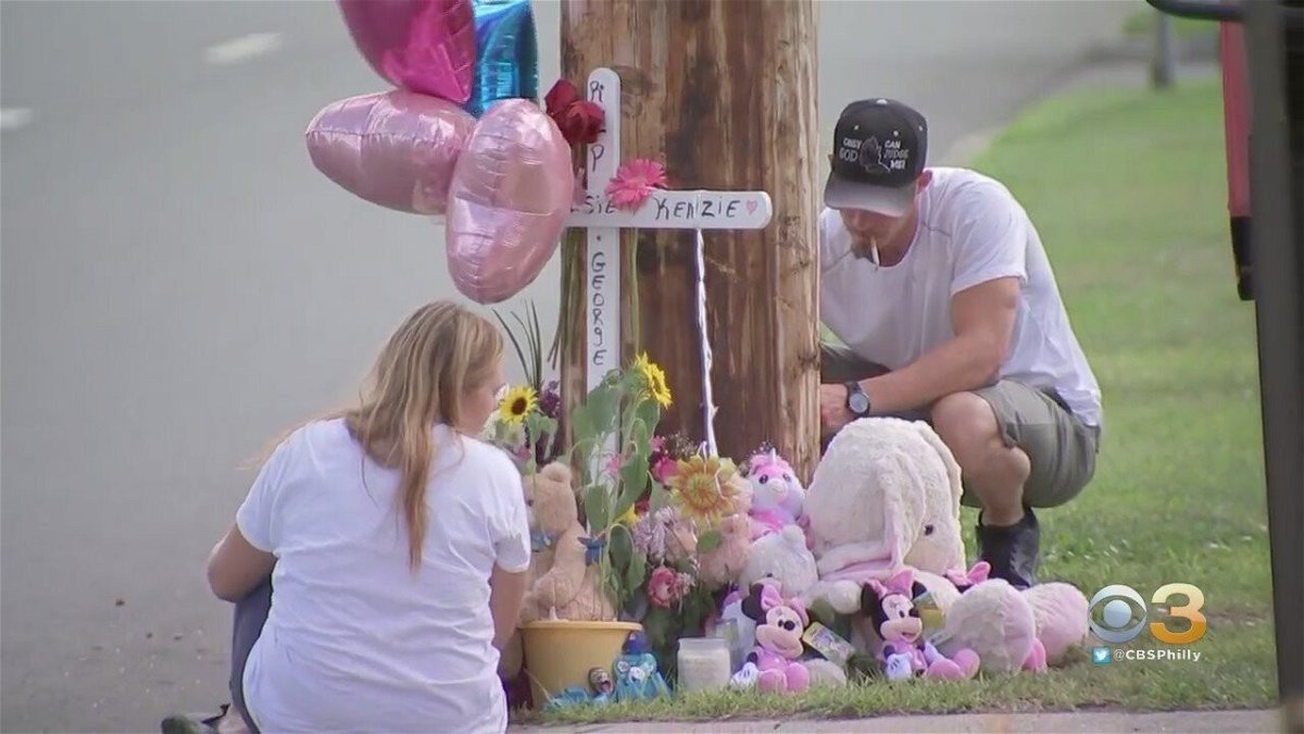<i>KYW</i><br/>People have paid their respects continuously at the site of a small memorial full of teddy bears and flowers after three children and a man died in a violent crash.