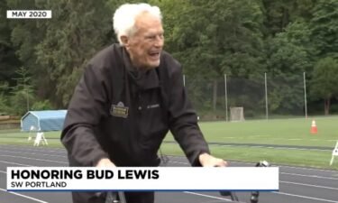 Bud Lewis walks 100 laps around a Portland