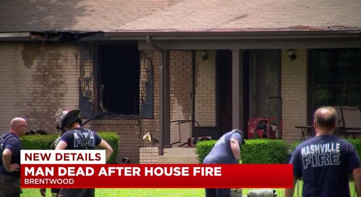 <i>WSMV</i><br/>Firefighters stand outside of a Nashville home that burned in what authorities call an intentionally set fire. A man died as a result of the blaze and police say they arrested his son.