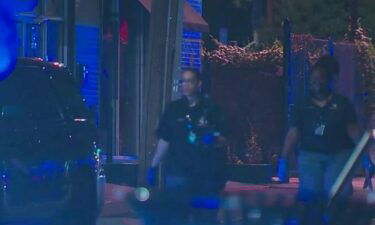 Bullets blasted through an Atlanta bar early Friday night striking two bartenders