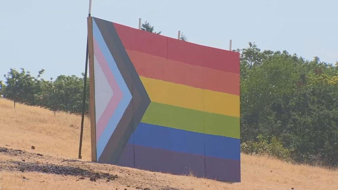<i>KPTV</i><br/>A giant pride flag was constructed on a farm less than two miles from Newberg High School following a school board vote to ban that type of sign