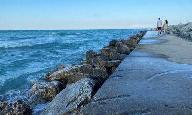 A 40-year-old man died after saving two children who were "in distress" in the water near the pier north of North Beach and Zoo Beach