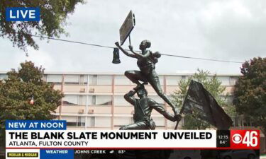 Dr. Bernice King along side sculptor Kwame Akoto-Bamfo unveiled his work " The Blank Slate Monument" at the historic king center. According to it's creator it's a 7-foot tall 700 pound sculpture that is a tribute to African American History in the face of the confederacy.