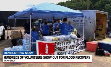 Hundreds of volunteers gathered on Saturday to clean up the town of Waverly and help the victims of the deadly flooding in Humphreys County.