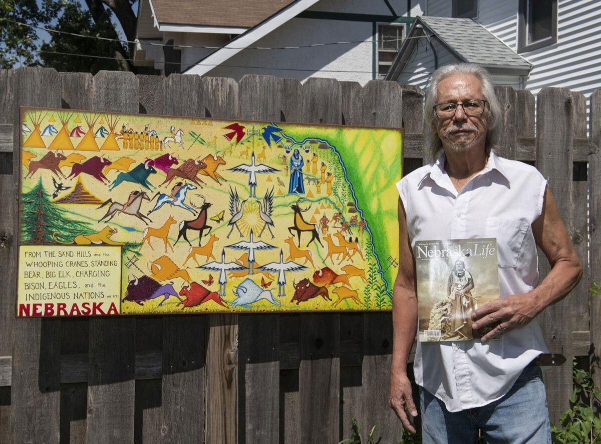 <i>Lincoln Journal Star</i><br/>Omaha artist Donel Keeler poses with his artwork in 2019. Keeler created Nebraska's First People license plate.