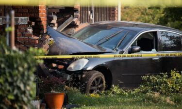 Police say an 18-year-old was found dead outside of this car