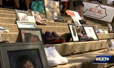 A memorial at the August 29 Mothers of Murdered Sons and Daughters event in Louisville shows some of the victims of violence.