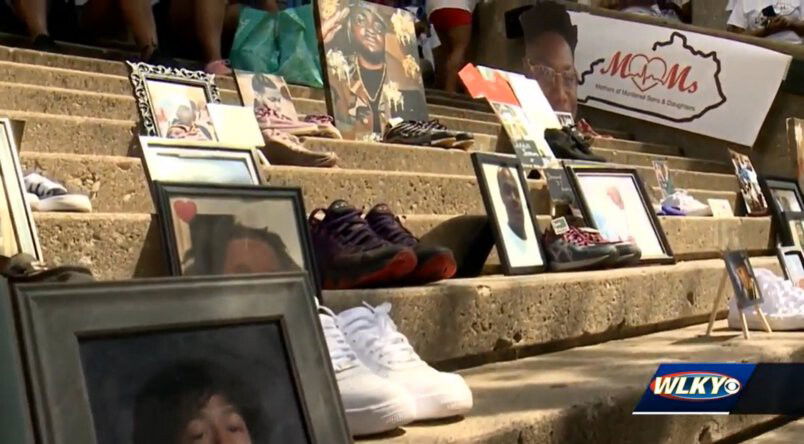 <i>WLKY</i><br/>A memorial at the August 29 Mothers of Murdered Sons and Daughters event in Louisville shows some of the victims of violence.
