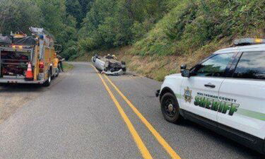 A vehicle tumbled down an embankment and landed on its roof on the roadway on August 30