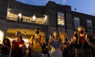 University of Nebraska-Lincoln students and supporters gathered fore a candlelight vigil outside the Nebraska Union on Aug. 30 in a show of solidarity with sexual assault survivors.