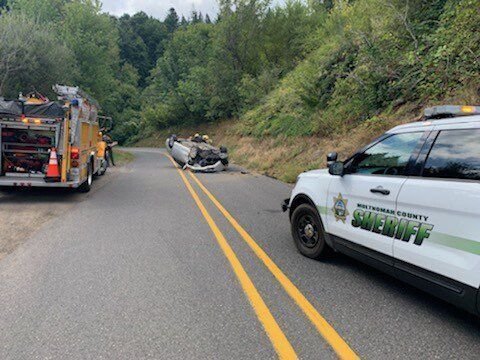 <i>Multnomah County Sheriff’s Office via KPTV</i><br/>A driver is lucky to be alive after a serious crash in which their vehicle tumbled down an embankment and landed on its roof on the roadway below the Vista House.