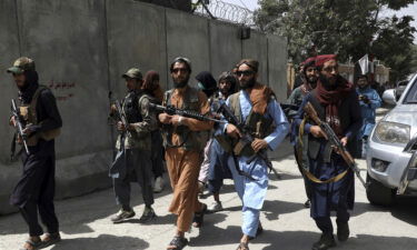 US diplomats wrote a classified cable to Secretary of State Antony Blinken in mid-July warning that swift action needed to be taken because they believed the situation in Afghanistan could rapidly deteriorate and pictured Taliban fighters in Kabul on Aug. 18.