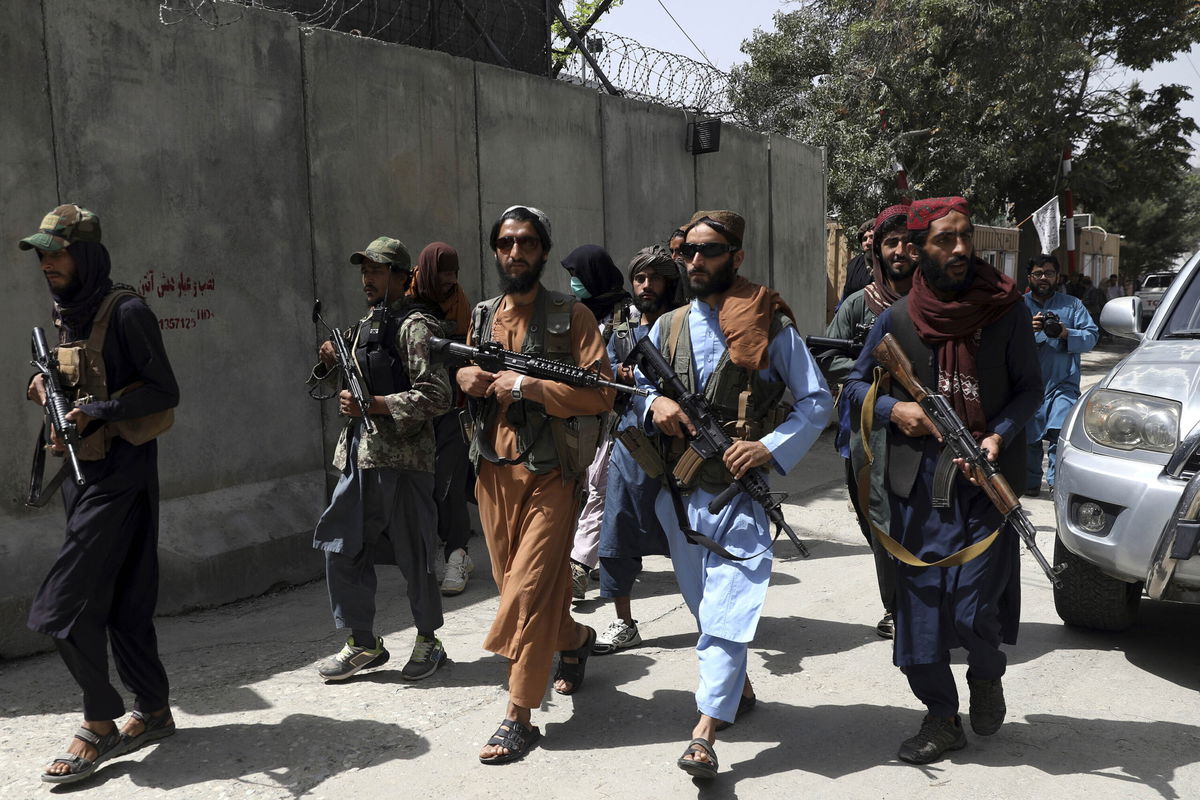 <i>Rahmat Gul/AP</i><br/>US diplomats wrote a classified cable to Secretary of State Antony Blinken in mid-July warning that swift action needed to be taken because they believed the situation in Afghanistan could rapidly deteriorate and pictured Taliban fighters in Kabul on Aug. 18.