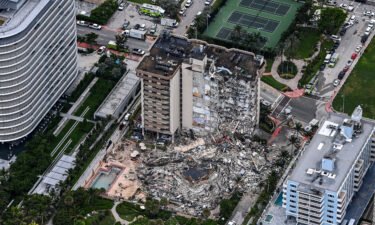 Miami-Dade leaders announce a series of meetings for policy changes after the Surfside condo building collapse. Aerial image shows the collapsed building on June 24.