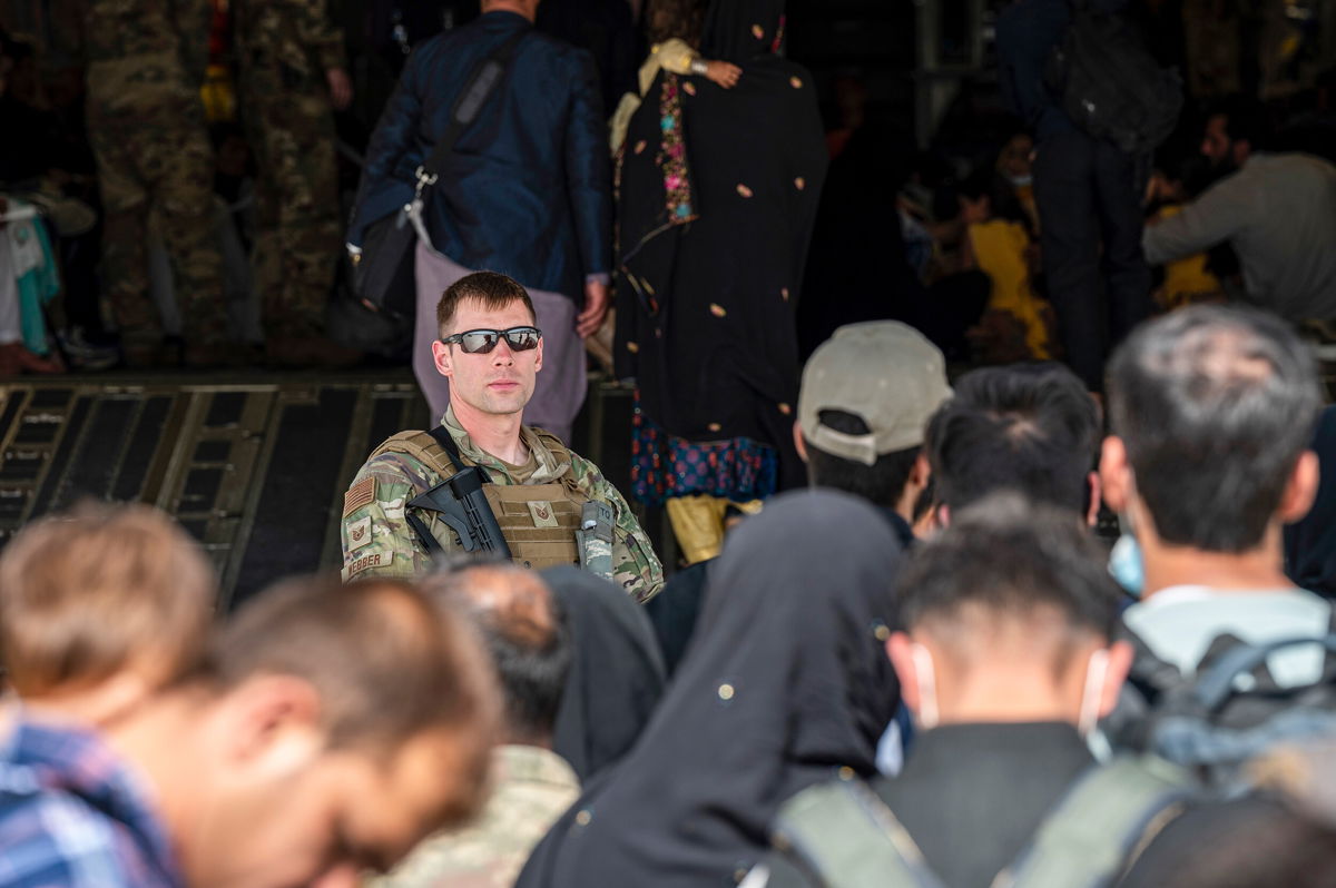 <i>Senior Airman Taylor Crul/U.S. Air Force/AP</i><br/>Nongovernmental groups and newly formed ad hoc volunteer organizations have worked around the clock to identify Afghans and get their names into the hands of the State Department