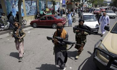 Taliban fighters patrol in Kabul