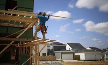 The housing boom could be losing steam. A contractor here works in a subdivision in Louisville