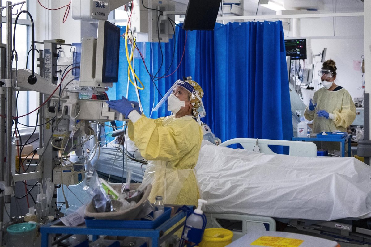 <i>Victoria Jones/PA/AP</i><br/>Nurses care for Covid-19 patients in the Intensive Care Unit in St George's Hospital in Tooting