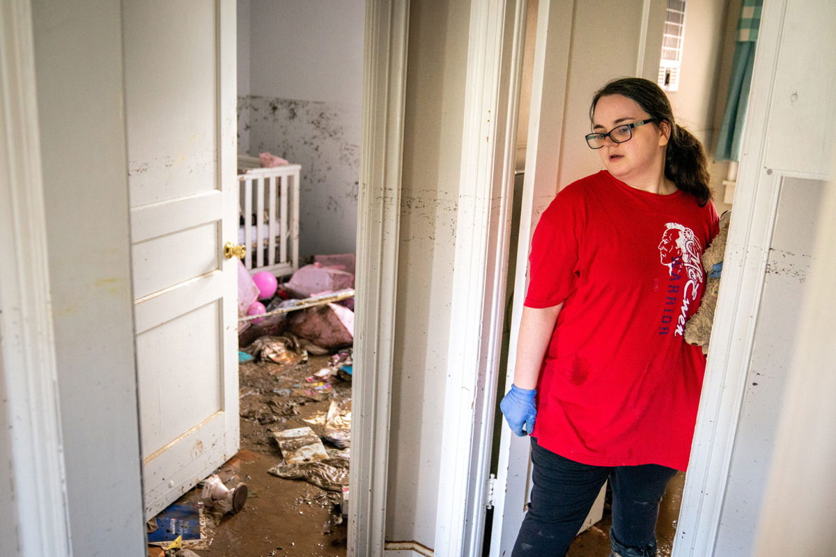 <i>Andrew Nelles/The Tennessean/USA Today Network</i><br/>Vanessa Yates checks the damage inside of her home in Waverly following the flood.