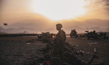 U.S. Army Soldiers stand security at Hamid Karzai International Airport