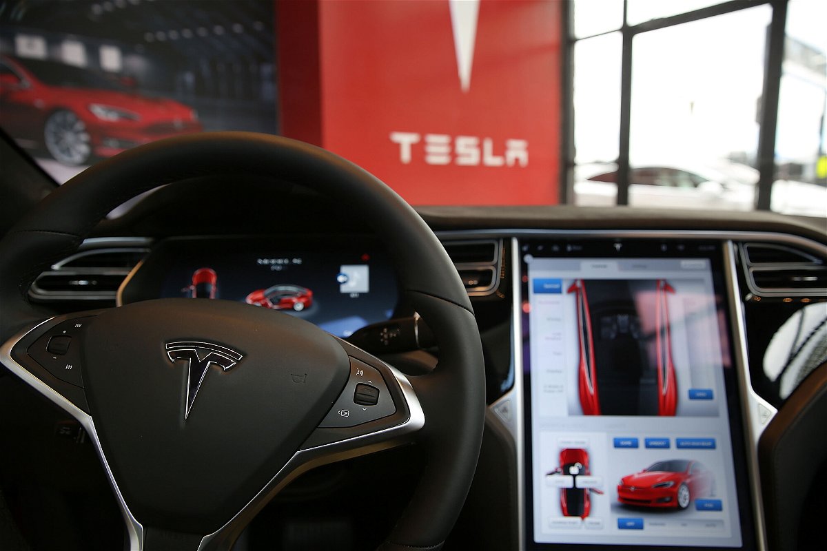 <i>Spencer Platt/Getty Images</i><br/>Senators call for a federal probe into Tesla's Autopilot claims. The inside of a Tesla vehicle is displayed in this image.