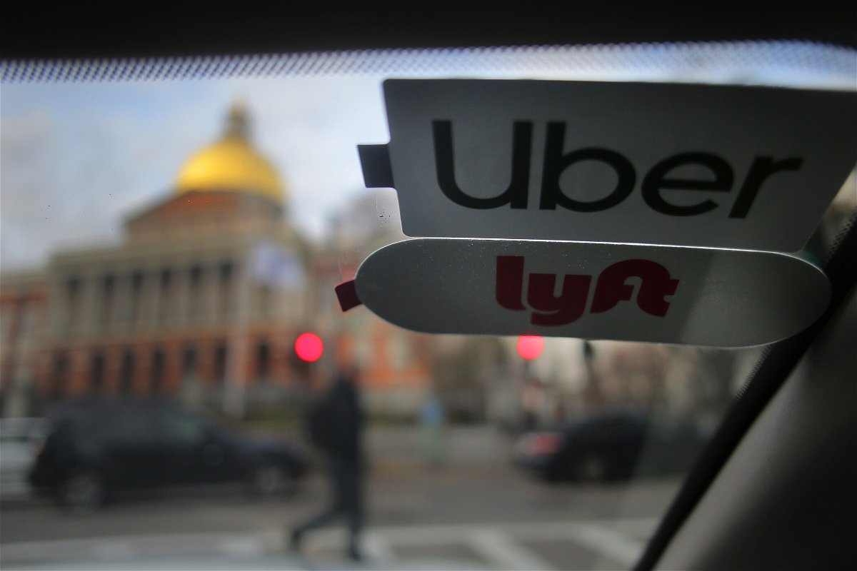 <i>Lane Turner/The Boston Globe/Getty Images</i><br/>Uber and Lyft