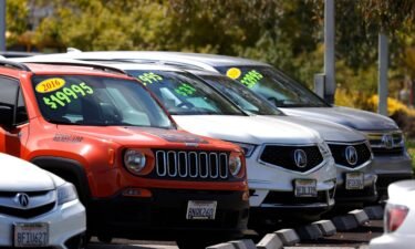 Used cars are displayed on the sales lot at Marin Acura on July 13 in Corte Madera