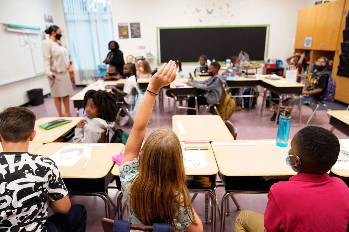 <i>Brynn Anderson/AP</i><br/>As schools start classes across the United States
