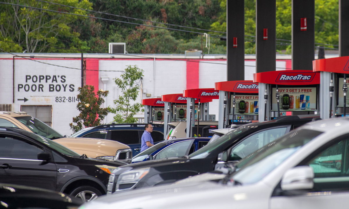 <i>Chris Granger/The Times-Picayune/The New Orleans Advocate/AP</i><br/>Long lines build at a gas station in Jefferson