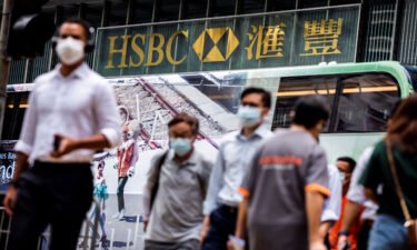 HSBC staged a strong recovery in the first half of the year. Pedestrians walk outside the HSBC Main Building in Hong Kong on August 2.