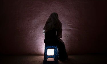 A Tigrayan refugee rape victim who fled the conflict in Ethiopia's Tigray sits for a portrait in eastern Sudan near the Sudan-Ethiopia border