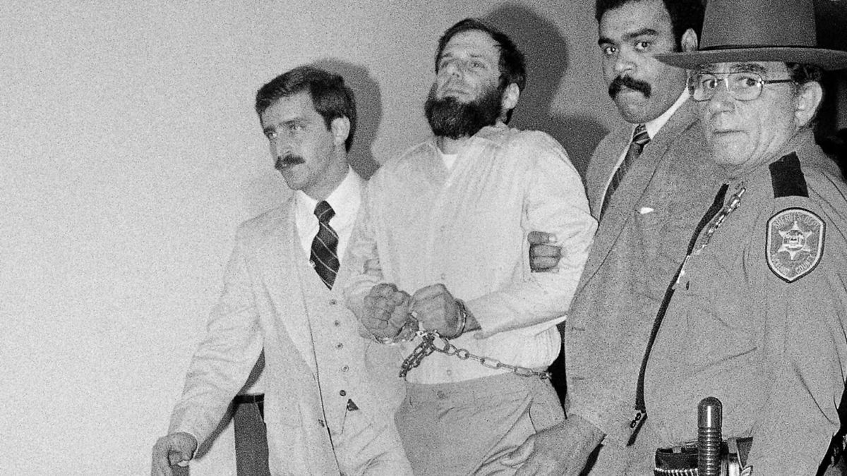 <i>David Handschuh/AP</i><br/>Outgoing New York Governor Andrew Cuomo commuted the sentence of the San Francisco District Attorney Chesa Boudin's father on Monday evening. A handcuffed David Gilbert is seen here in 1981 after a hearing in his felony murder case.