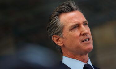 California Gov. Gavin Newsom looks on during a press conference at The Unity Council on May 10