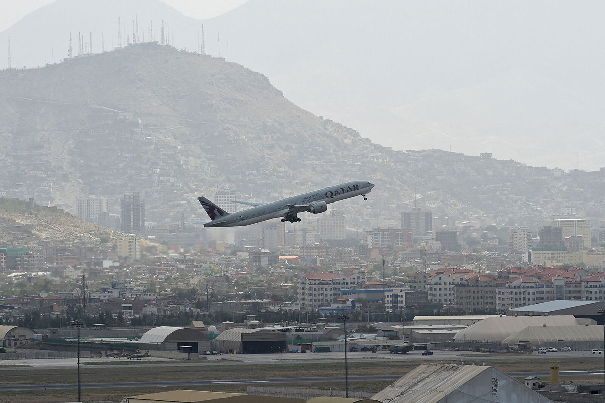 <i>Wakil Kohsar/AFP/Getty Images</i><br/>This picture taken on August 14 shows a Qatar Airways aircraft taking-off from the airport in Kabul.