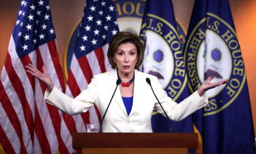 House Democrats are divided over how to enact President Joe Biden's sweeping infrastructure agenda. Nancy Pelosi is seen here at the U.S. Capitol on May 20