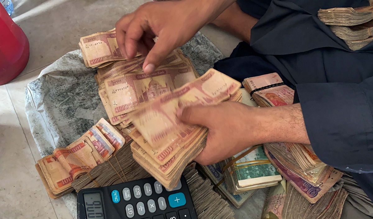 <i>Haroon Sabawoon/Anadolu Agency/Getty Images</i><br/>Afghanistan's currency has tumbled to record lows this week as the Taliban seizes control of the country.