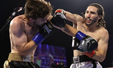 Jordan Weeks (L) and Nico Ali Walsh (R) exchange punches during their fight at the Hard Rock Hotel & Casino Tulsa on August 14 in Catoosa