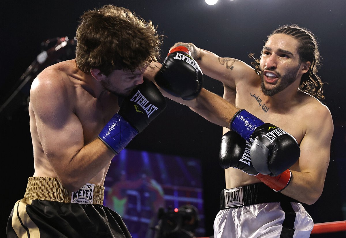 <i>Mikey Williams/Top Rank Inc/Getty Images</i><br/>Jordan Weeks (L) and Nico Ali Walsh (R) exchange punches during their fight at the Hard Rock Hotel & Casino Tulsa on August 14 in Catoosa