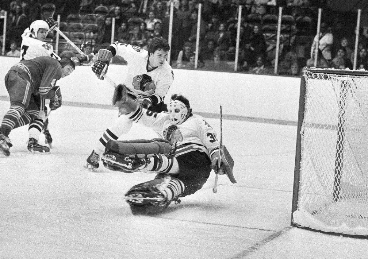 <i>Fred Jewell/AP</i><br/>Chicago Blackhawks goalie Tony Esposito stops a Buffalo Sabres shot during a game in Chicago on December 19
