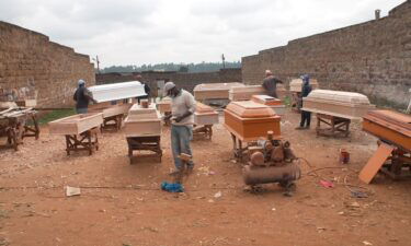 Kenya's coffin makers have struggled to keep up with demand during the pandemic.