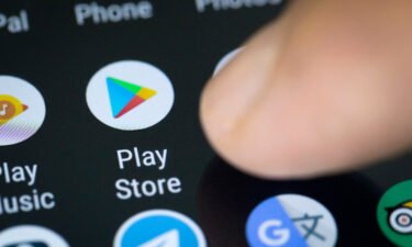 Google and Apple are catching heat for their app store and payments practices in Asia Pacific. A Google Play store icon is seen on a smartphone screen.